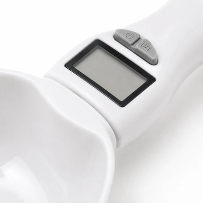 Cuillère chat › Axdose : close-up écran digital et boutons de contrôle - AstuceChat